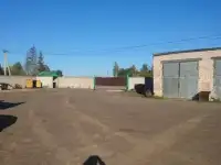 Продается заасфальтированная территория с гаражём