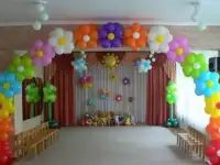 Композиция из шаров Арка из цветочков, солнышко, стойки, бабочки