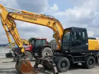 Услуги колесного экскаватора полноповоротного