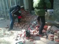 демонтаж стен кирпич