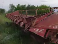 Продам жатку НАШ подсолнечную . кукурузную  12 рядковую , 9 метров