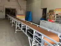 Горизонтальный конвейер для работы в холодильнике.