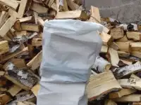 Дрова березовые колотые в мешках