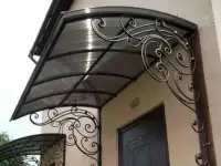 Козырьки кованые над входом