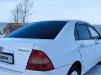 Toyota Corolla 2004 год, фотография 5