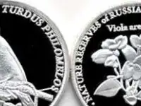 Инвестиционная серебряная монета певчий дрозд