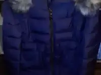 Продам пуховик женский новый