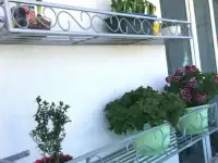 Оконные цветочницы