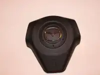Ремонт накладки в руль на Mazda III