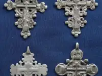 Конволют из 4-х наперсных серебряных крестов XV века.