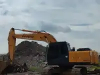 Услуги гусеничного экскаватора