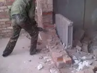 демонтаж перегородок полов кафеля