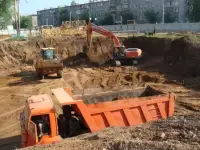 Разработка котлованов, рытье траншей, ям