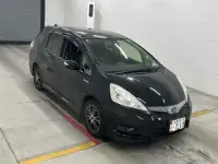 Универсал гибрид Honda Fit Shuttle Hybrid кузов GP2 модификация Hybrid Fine Line