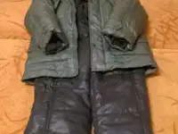 Продам новый зимний комбинезон