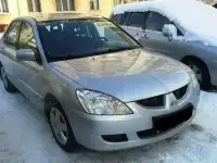 Мицубиси лансер Mitsubishi Lancer