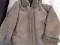 Новый мутоновый полушубок. Дублёнка б/у