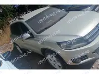 Автомобиль Volkswagen Tiguan, 2012, фотография 2