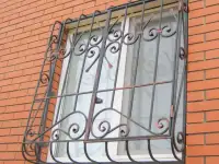 Решетки на окна кованые, фотография 8