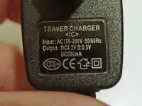 Универсальная зарядка TRAVEL CHARGER., фотография 2