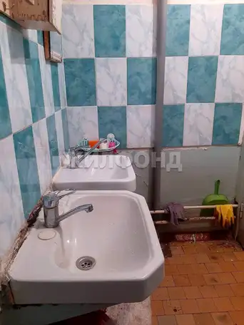 Продается комната 13.7 м2 в 1 ком.кв., фотография 11
