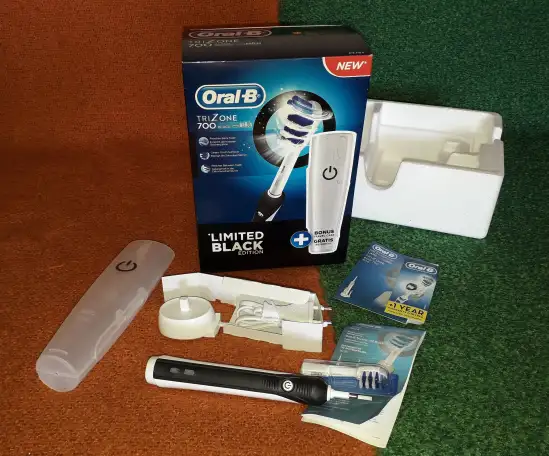 Электрическая зубная щетка Braun Oral-B TriZone 70, фотография 1