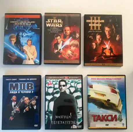 DVD Звездные войны, Люди в черном, Матрица, Такси 4, Робинзон Крузо, фотография 1
