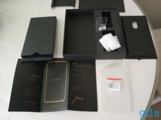 Черная коробка смартфона Xiaomi Mi Mix 2 new и  бумажки от него, фотография 4