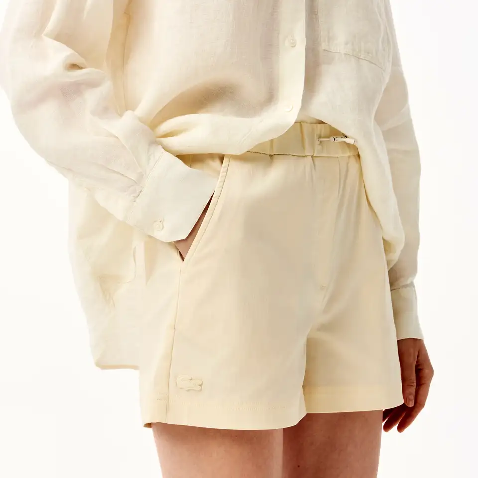 Женские короткие однотонные шорты lacoste, фотография 5