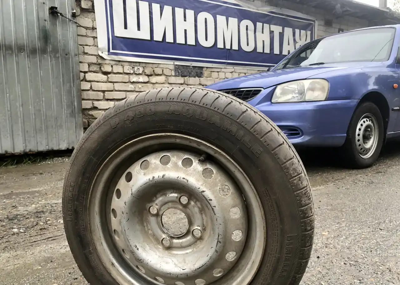 Колесо б/у 5.5xR13 4x100 ET49 DIA56.6 Pirelli P400 Aquamile P 165/65 R13 77T, фотография 1