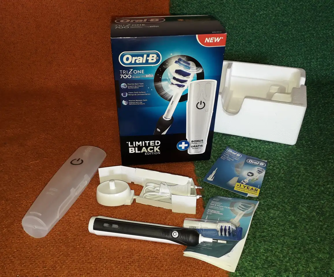 Электрическая зубная щетка Braun Oral-B TriZone 70, фотография 1