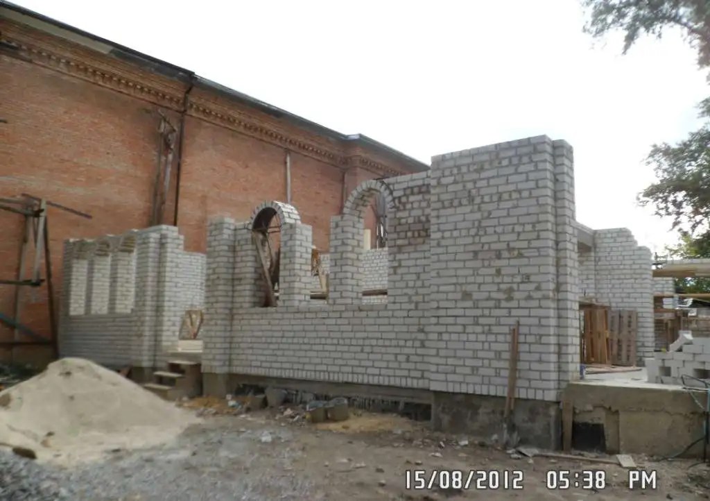 Каменщик кладка кирпича, фотография 2