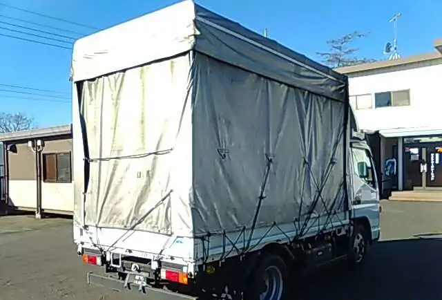 Грузовик бортовой тентованный MITSUBISHI CANTER кузов FE70D год вып 2010 грузоподъемность 3 тн, фотография 1