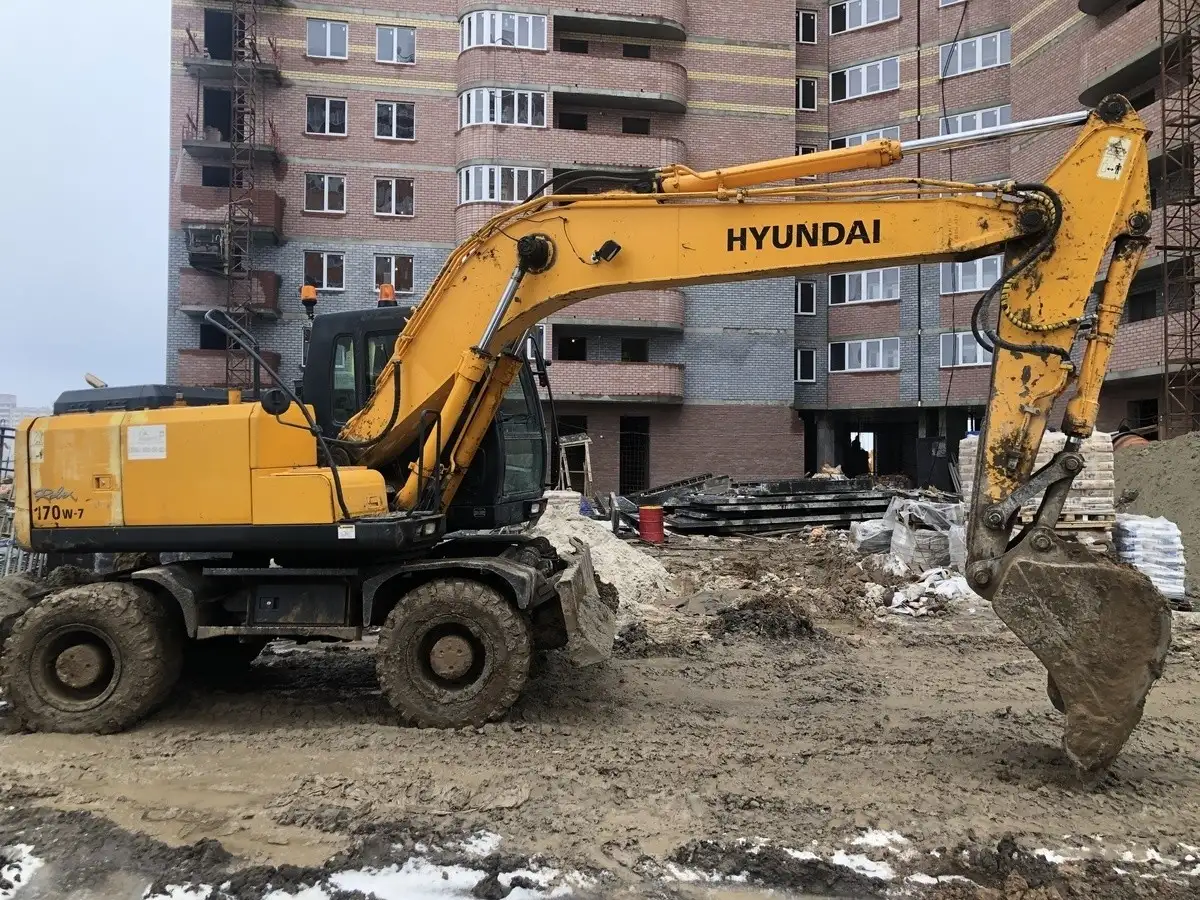 Услуга аренды колесного полноповоротного экскаватора, фотография 2
